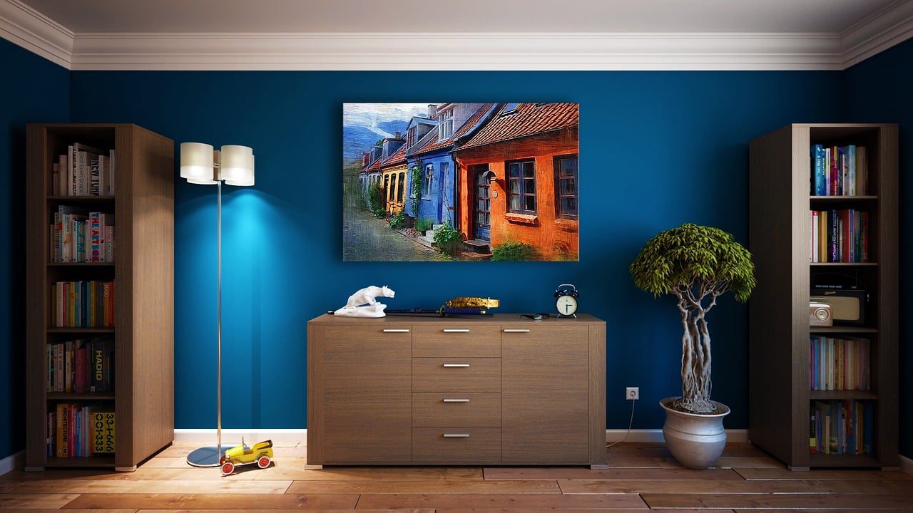A painting of a house on the wall